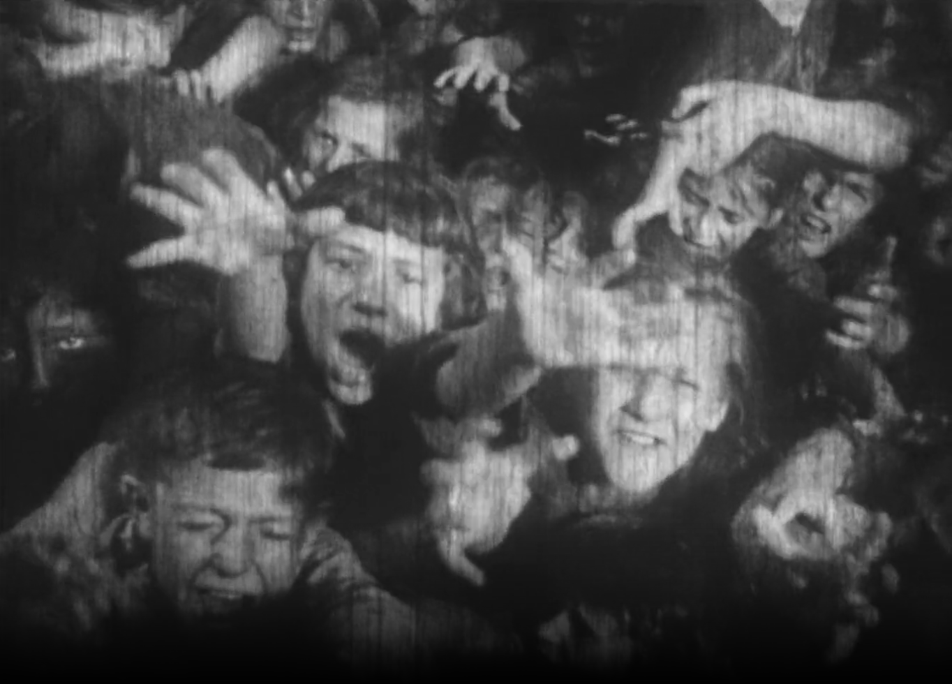 Masses of children, forming a horrifying image.